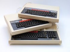 Three BBC Acorn microcomputer systems.