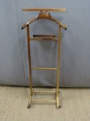 A wooden valet stand