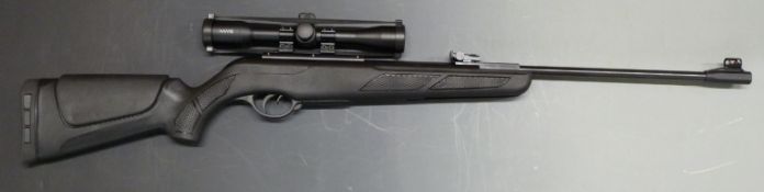 Gamo Shadow DX .22 air rifle with moulded semi-pistol grip, raised cheek piece and Hawke Vantage