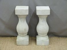 Twelve reconstructed stone columns, height 61cm