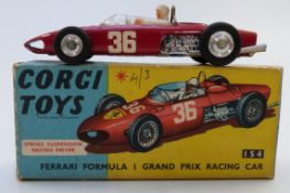 Corgi Toys diecast model Ferrari Formula 1 Grand Prix Racing Car with red body, white driver and