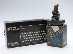 Sinclair ZX Spectrum vintage personal computer together with a matching Joystick SJS1, both in
