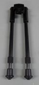 Rifle bi-pod with extending legs to fit an 11mm rail.