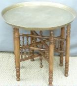 Brass topped folding Eastern style table, diameter 58cm