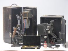 Spencer, Buffalo USA microscope in case, travelling beam scale and a Home Kodascope cine projector