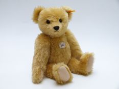 Steiff classic 1909 Teddy bear with blonde mohair, felt pads, growler and jointed limbs, 42cm tall