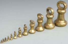 A run of 12 bell weights 7lb to 1lb, the 4lb example marked Banfield, Brighton