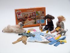 Two Sindy dolls together with a collection of clothes and accessories including Furnishing Pack in