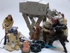 A large collection of mainly Star Wars action figures, buildings and accessories