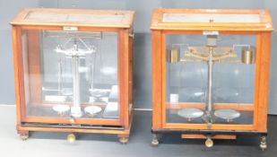 Two cased sets of laboratory scales, both marked L.Oertling London EC, width of each approximately