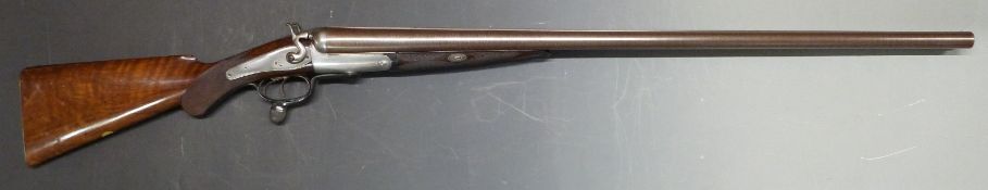 Army & Navy CSL 8 bore side by side hammer action shotgun with named and border engraved locks, line
