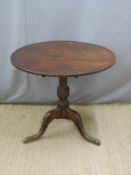 A 19thC oak tilt top table, diameter 78cm