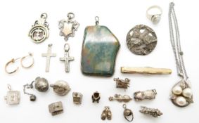 An agate pendant, silver pendant set with pearls, a quantity of silver charms, silver brooch, a pair