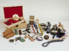 A collection of costume jewellery including a sodalite necklace, watches, jet brooch, silver