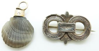 Victorian carved agate pendant in the form of a shell and a silver Victorian brooch