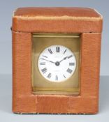 Rockbank and Atkin London, brass carriage clock in corniche style case, the enamelled Roman dial