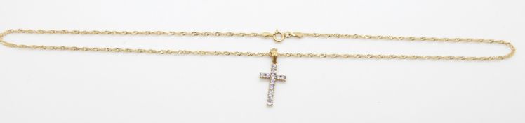 A 9ct gold cross pendant set with tanzanite on 9ct gold necklace/chain, 2.5g, 25cm drop