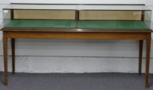 Early to mid 20thC mahogany bench display or haberdashery shop cabinet with twin doors to rear,