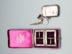 H.Samuel cased pair of George V hallmarked silver buckles, Birmingham 1911, together with a
