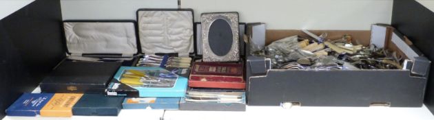 A large quantity of silver plated cutlery, some cased but most loose, including some sets
