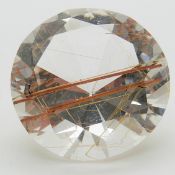 A loose round cut quartz with rutile inclusions, approximately 19ct