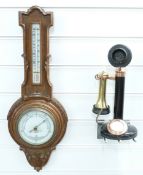 Edwardian oak framed carved aneroid barometer by J.H Steward Ltd, London, 60cm tall, together with a
