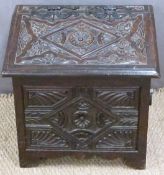 Carved oak coal or similar storage box, W53 x D40 x H51cm