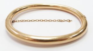 A yellow metal bangle, 13.3g