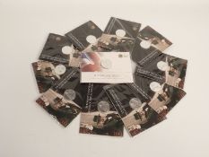 Ten 2015 Sir Winston Churchill £20 fine silver coins and a 2013 Timeless First, all unopened