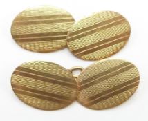 A pair of 9ct gold engine turned cufflinks, 6.4g