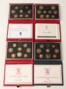 Four Royal Mint UK proof coin sets for 1984, 1986, 1989 and 1990, with certificates