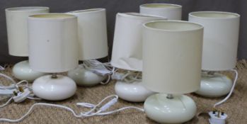 Seven matching table / bedside lamps