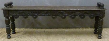 Oak carved bench or window seat with carved decoration, L134 x D27 x H48cm