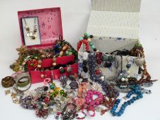 A collection of costume jewellery including large beaded necklaces, etc