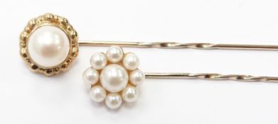 Two 9ct gold stick pins set with pearls