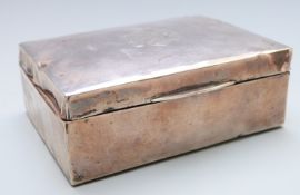 George V hallmarked silver cigarette box, Birmingham 1928 maker F.H.Adams Ltd, width 11cm