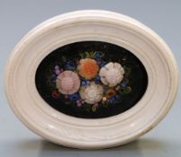 Onyx micro mosaic panel of flowers in ivory frame, overall maximum diameter 6cm