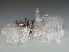 A collection of glass and silver plated items to include Stuart Crystal decanter with suite of