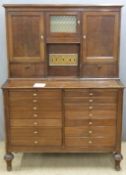 Early to mid 20thC dentist's cabinet, the top fitted with five various cupboards with glass liners