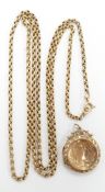A 9ct gold Victorian guard chain with a 9ct gold back and front locket
