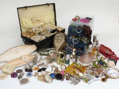 A collection of costume jewellery including two 9ct gold rings, 9ct gold earrings, costume jewellery