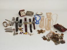 A collection of jewellery and watches including Swatch, faux pearls, silver bracelet, coins etc