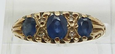 A 9ct gold ring set with sapphires and diamonds (size O)
