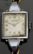 J W Benson Art Deco style ladies wristwatch with gold hands and Arabic numerals and signed 15