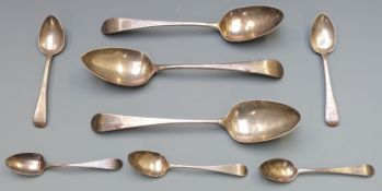 A quantity of Georgian hallmarked silver spoons comprising three table spoons and five teaspoons,