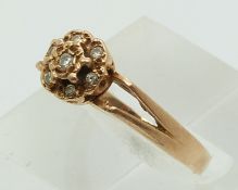 A 14ct rose gold ring set with diamonds (size N)