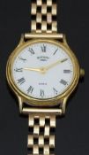 Rotary gold plated ladies wristwatch with gold hands, black Roman numerals, white dial, and quartz