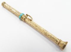 A yellow metal propelling pencil with engraved detail set with turquoise cabochons and a bloodstone