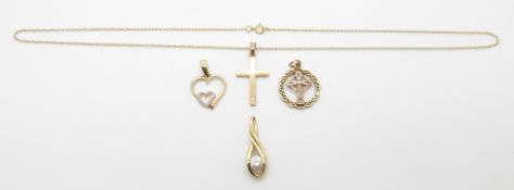 A 9ct gold heart pendant, 9ct gold Celtic cross pendant, 9ct gold cross on a 9ct gold chain (4.5g)