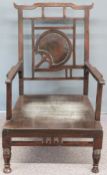 19thC/20thC oak or elm stained chair in the Chinese style by repute purchased from Liberty & Co,